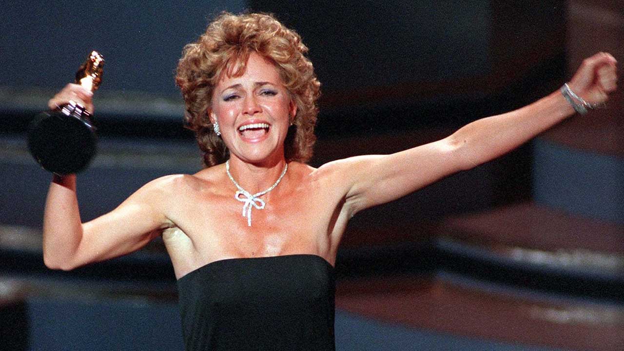 Actress Sally Field accepts her Academy Award for best actress in the film "Places in the Heart" at the Oscar ceremonies in Los Angeles March 26, 1985.